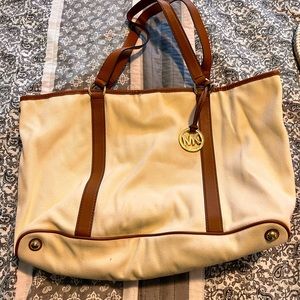 Michael Kors cream lathe tote bag